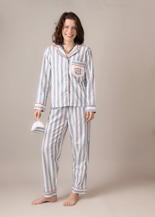 Woman wearing a  blue striped pajama set  cotton poplin 