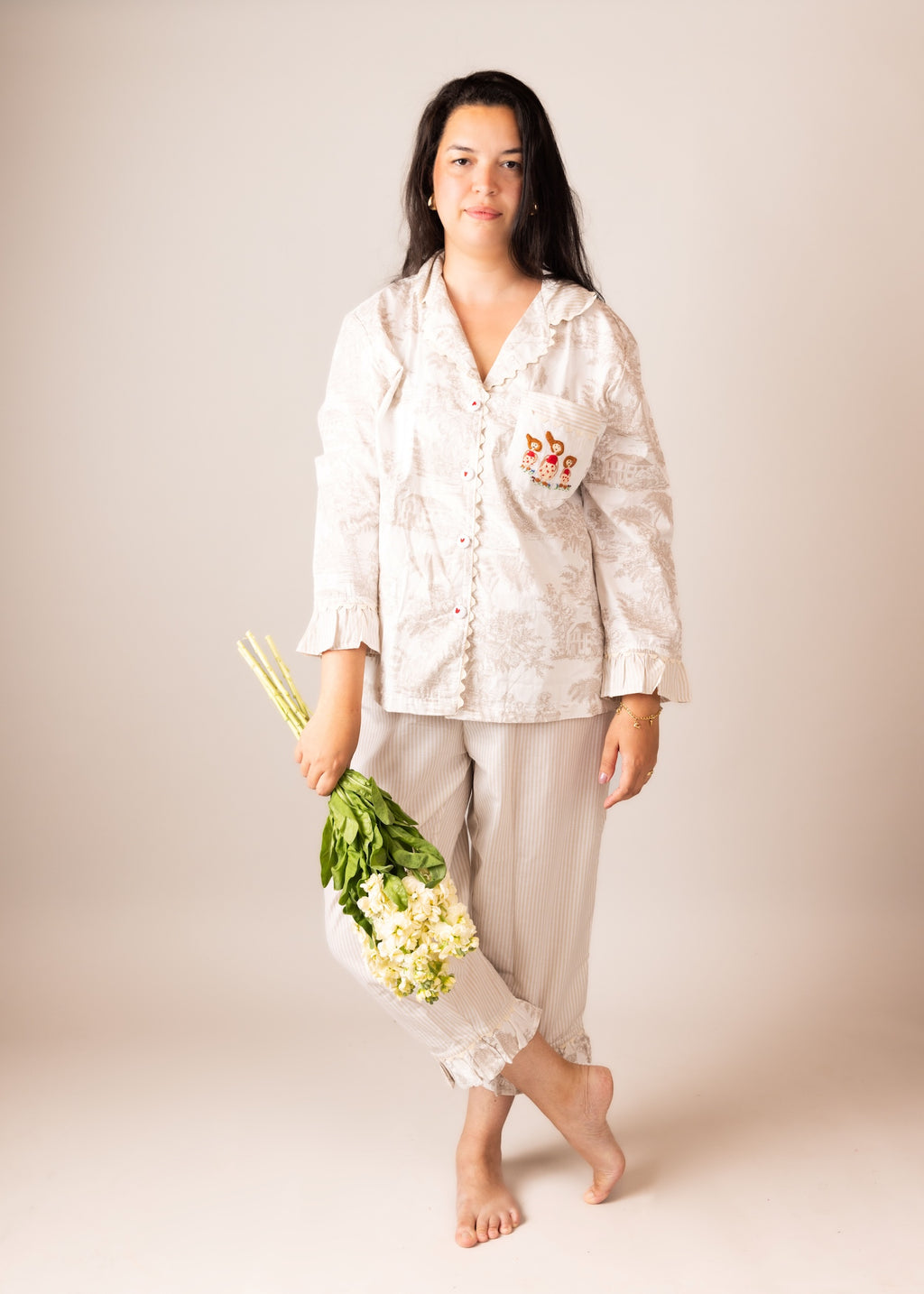 model wearing a beautiful and delicate pyjama set from ps61 in the uk